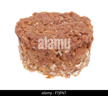 A large chunk of canned corned beef isolated on a white background. Stock Photo