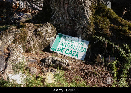 Sign in spanish saying Andalusian hunting reserve, Sierra de las Nieves, Andalusia, Spain. Stock Photo