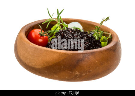 Black boiled rice with thyme Stock Photo