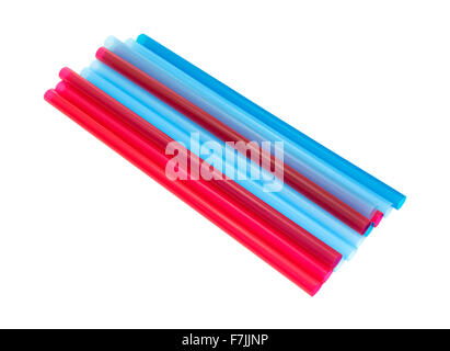 A group of jumbo sized colorful drinking straws for smoothies and milkshakes isolated on a white background. Stock Photo
