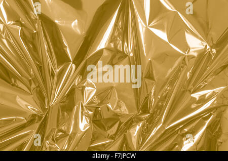 golden shiny metallic foil background Stock Photo