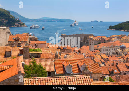 Dubrovnik, Dubrovnik-Neretva County, Croatia.  View over rooftops of the old town from the Minceta Tower. Boats in the Old Port. Stock Photo