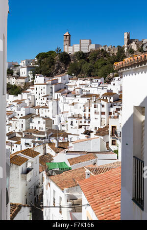 Casares, Malaga Province, Andalusia, southern Spain. View across village to the remains of the Arab castle and church. Stock Photo