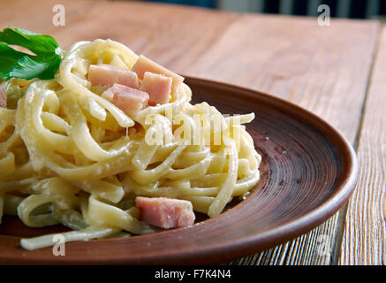 Fettuccine alla papalina - pasta with prosciutto,parmesan,butter Stock Photo