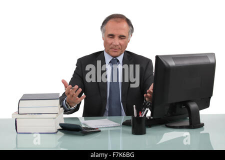 businessman working at his desk Stock Photo