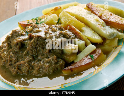 Stoofvlees - Dutch Stoverij, traditional Belgian and French Flemish sweet-sour beef and onion stew . Stock Photo