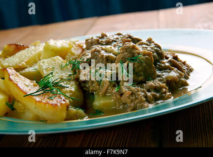 Stoofvlees - Dutch Stoverij, traditional Belgian and French Flemish sweet-sour beef and onion stew . Stock Photo