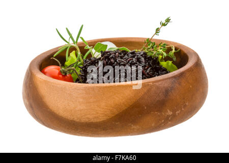 Black boiled rice with thyme Stock Photo