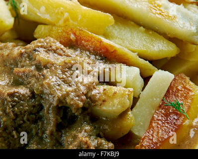 Stoofvlees - Dutch Stoverij, traditional Belgian and French Flemish sweet-sour beef and onion stew . Stock Photo