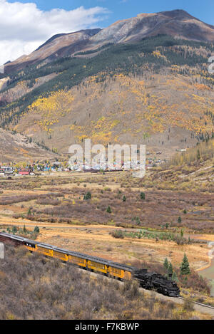 Durango & Silverton Narrow Gauge Railroad steam train along the Animas River in Southwest Colorado.