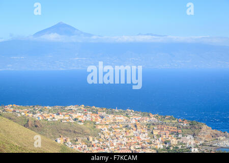 A photograph of San Sebastian de La Gomera in the Canary Islands, Spain. Mount Teide can be seen in the background. Stock Photo