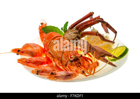 Spiny lobster, shrimps, crab legs  and rice Stock Photo