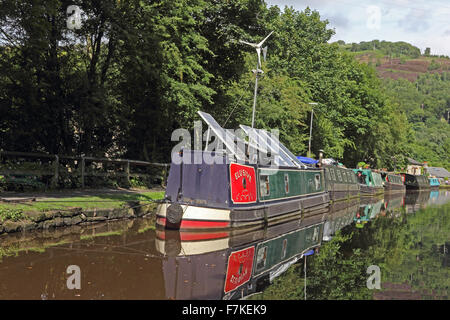Narrow boats moored on Rochdale Canal, Hebden Bridge Stock Photo
