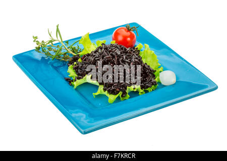 Black boiled rice with thyme Stock Photo