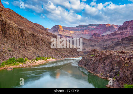 Morning clouds reflected in the Colorado River, Grand Canyon National Park, Arizona, Powell PLateau beyond Stock Photo