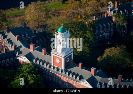 AERIAL VIEW of Harvard Campus featuring Eliot House Clock Tower along Charles River, Cambridge, Boston, MA Stock Photo