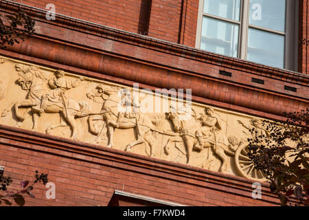 Washington, DC - A portion of a 1200-foot-long terra cotta frieze on the exterior of the National Building Museum. Stock Photo