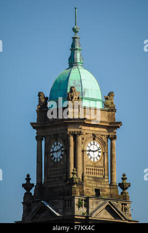 Clock tower of the town hall at Hamilton Square in Birkenhead, Wirral, against a blue cloudless sky Stock Photo