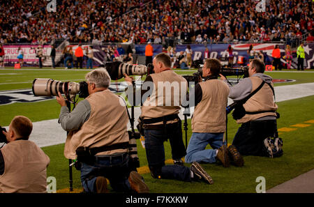 Professional Photographers take images from the sidelines at Gillette Stadium, the home of Super Bowl champs, New England Patriots vs. the Dallas Cowboys, October 16, 2011, Foxborough, Boston, MA Stock Photo