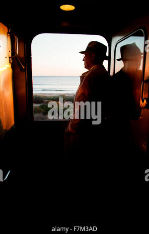 1940's reenactor looks out of window on Pearl Harbor Day Troop train reenactment from Los Angeles Union Station to San Diego Stock Photo