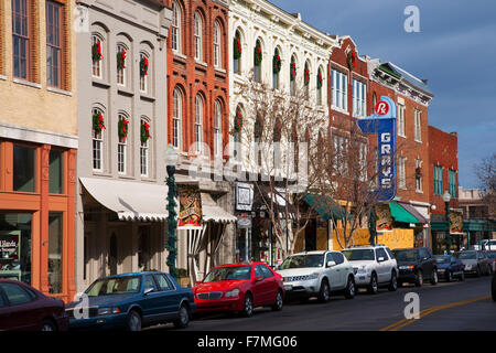 Historic Main Street with Red Brick Storefronts, parked cars and Gray's Pharmacy in Franklin, Tennessee, a suburb south of Nashville, Williamson County, Tenn. Stock Photo