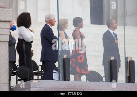 U.S. President Barack Obama, First Lady Michelle Obama, Caroline Kennedy, former president Bill Clinton, talk show host Oprah Winfrey listen to the National Anthem during the Let Freedom Ring ceremony at the Lincoln Memorial August 28, 2013 in Washington, DC. Stock Photo