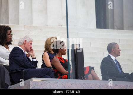 U.S. President Barack Obama, first lady Michelle Obama, Caroline Kennedy, former president Bill Clinton, talk show host Oprah Winfrey listen to former President Jimmy Carter's speech during the Let Freedom Ring ceremony at the Lincoln Memorial August 28, 2013 in Washington, DC. Stock Photo