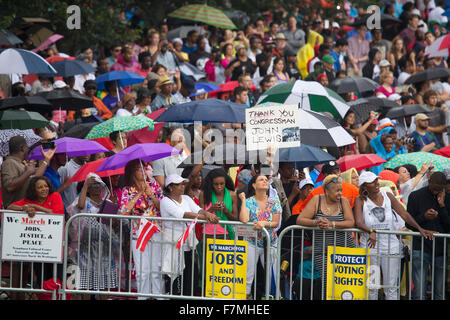 Audiences on the National Mall listen to Presidential speeches at the Let Freedom Ring ceremony at the Lincoln Memorial August 28, 2013 in Washington, DC, commemorating the 50th anniversary of Dr. Martin Luther King Jr.'s 'I Have a Dream' speech. Stock Photo