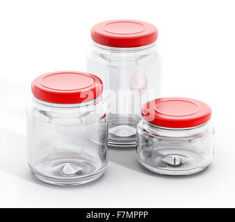 Glass jars with red lids isolated on white background Stock Photo