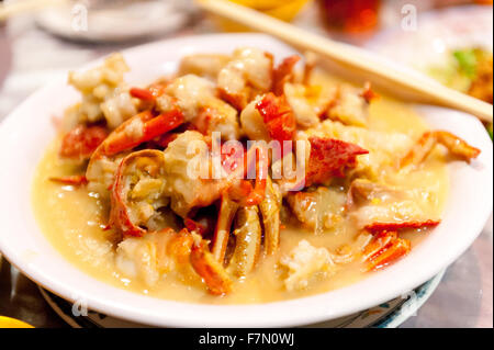 Cut up lobster dish in a white sauce Stock Photo