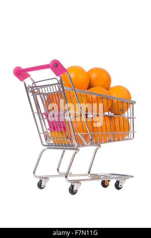 Supermarket trolley full of oranges isolated on white Stock Photo