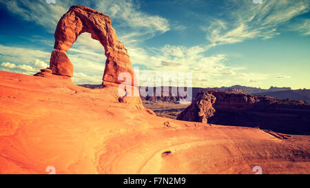 Vintage toned Delicate Arch at sunset, Utah, USA. Stock Photo