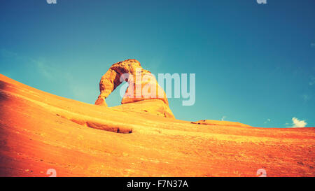 Retro toned Delicate Arch at sunset, Utah, USA. Stock Photo