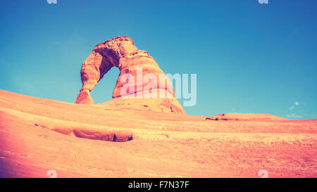 Vintage toned Delicate Arch at sunset, Utah, USA. Stock Photo