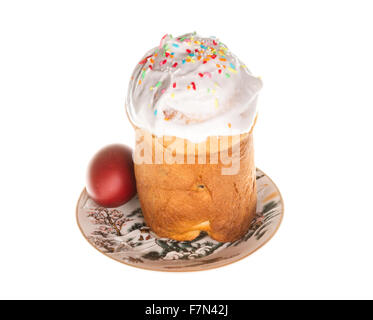 Easter cake with glace icing and easter eggs on white background Stock Photo