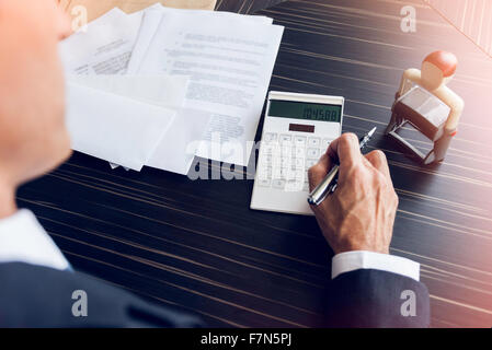 Businessman doing paperwork Stock Photo