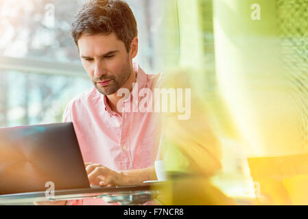 Man using laptop computer Stock Photo