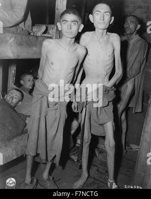 These inmates of the Amphing [i.e., Amphing] concentration camp in Germany were recently liberated by U.S. Third Army troops [...] Amphing, Germany Stock Photo