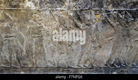 Wall frieze depicting Campaign against the town of -alammu. Assyrian, about 700-692 BC From Nineveh, South-West Palace, Room XIV, panels 4-6. Iraq. Stock Photo
