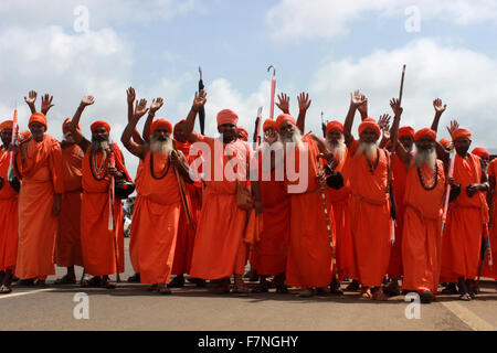 Group of sadhus in saffron colored clothing Kumbh Mela, Nasik, Maharashtra, India Stock Photo