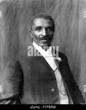 Photographic print of George Washington Carver (born into slavery in 1861or1864 - 1943), half-length portrait, facing right, Tuskegee Institute, Tuskegee, Alabama by Benjamin Frances Johnston, (1864-1952). Stock Photo