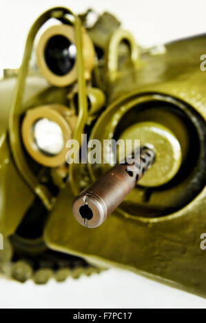 Detail shot with a machine gun on a green old army tank Stock Photo