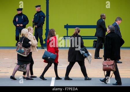 (151202) -- PARIS, Dec. 2, 2015 (Xinhua) -- Police officers patrol the site of the 2015 United Nations Climate Change Conference (COP 21) at Le Bourget on the northern suburbs of Paris, France, Dec. 2, 2015. The Paris climate talks entered stage of substantive negotiations on Tuesday as negotiators began to turn political will that their leaders expressed into concrete solutions to various disputes over a new climate agreement. Officials from 195 countries have one final week to slim the agreement draft which now runs over 50 pages to a manageable level so that their ministers could read when Stock Photo