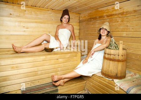 Young girls is taking steam-bath at sauna Stock Photo - Alamy