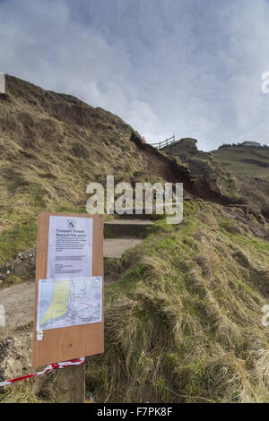 View of the storm-damaged cliffs and steps at Rhossili Bay, Gower, Swansea, Wales, pictured here in February 2014. Part of the cliff face collapsed on 22 January 2014 following erosion caused by powerful storm surges. Stock Photo