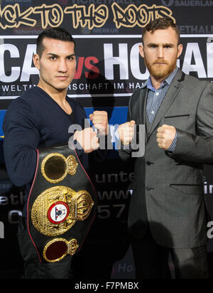 Hamburg, Germany. 02nd Dec, 2015. German boxer Jack Culcay (L) and his Irish contender Dennis Hogan pose after a press conference in Hamburg, Germany, 02 December 2015. Germany's Jack Culcay is due to face Ireland's Dennis Hogan in a WBA world super Welterweight bout on 05 December 2015. Photo: CHRISTIAN CHARISIUS/dpa/Alamy Live News Stock Photo