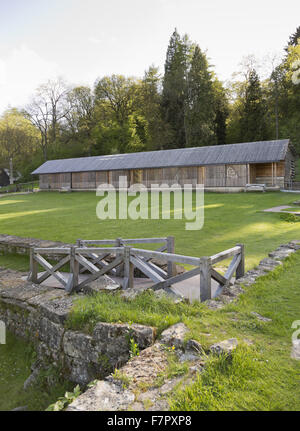 Building covering the ruins at Chedworth Roman Villa, Gloucestershire. Chedworth Roman Villa was one of the grandest villas in Roman Britain and is one of the best-preserved Roman sites in the country. Stock Photo