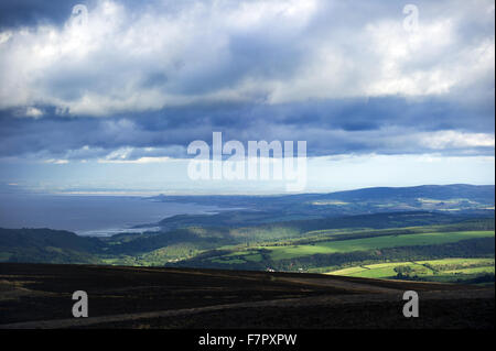 View towards the Bristol Channel from Dunkery Beacon, Exmoor's highest point and part of the Holnicote Estate, Exmoor National Park, Somerset. Stock Photo