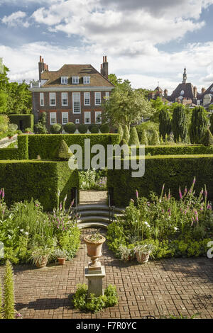 Fenton House and Garden, London. Fenton House was built in 1686 and is filled with world-class decorative and fine art collections. The gardens include an orchard, kitchen garden, rose garden and formal terraces and lawns. Stock Photo