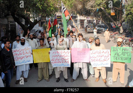 Activists of Ahle Sunnat Wal Jamat chant slogans against attack on military police officials and attack on local media channel journalists during protest demonstration at Hyderabad press club on Wednesday, December 02, 2015. Stock Photo